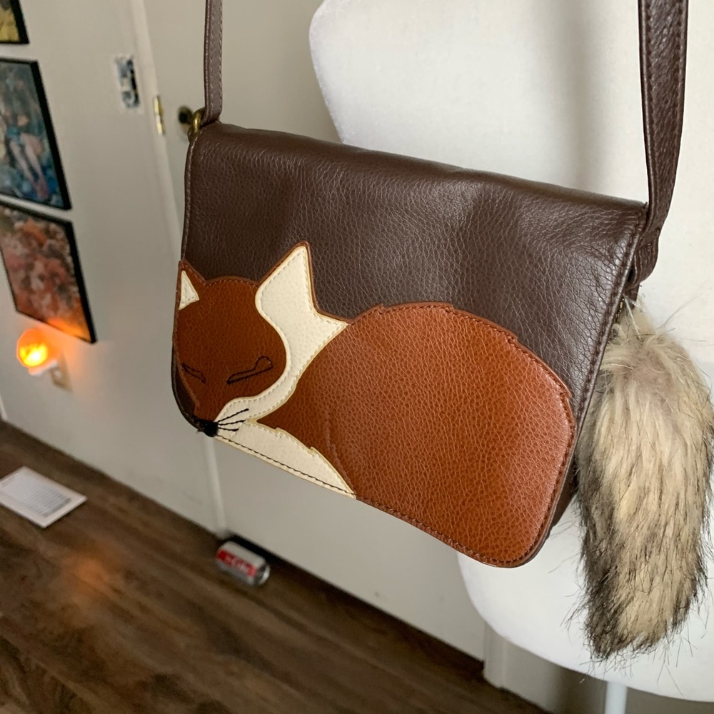 Foxy lil vintage purse and a Diet Coke